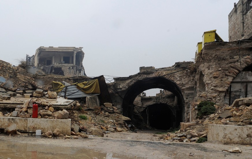 A general view shows damage on the entrance to al-Zarab souk in the Old city of Aleppo, Syria December 13, 2016. REUTERS/Omar Sanadiki SEARCH "ALEPPO HERITAGE" FOR THIS STORY. SEARCH "W ...