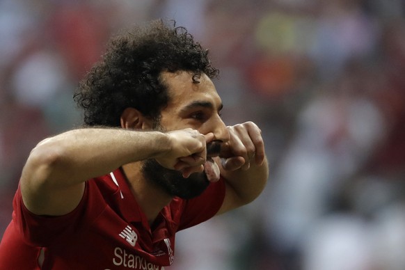 Liverpool&#039;s Mohamed Salah celebrates after scoring his side&#039;s opening goal during the Champions League final soccer match between Tottenham Hotspur and Liverpool at the Wanda Metropolitano S ...