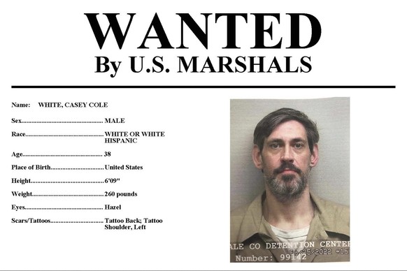 This image provided by the U.S. Marshals Service on Sunday, May 1, 2022 shows part of a wanted poster for Casey Cole White. On Sunday, the U.S. Marshals announced it is offering up to $10,000 for info ...