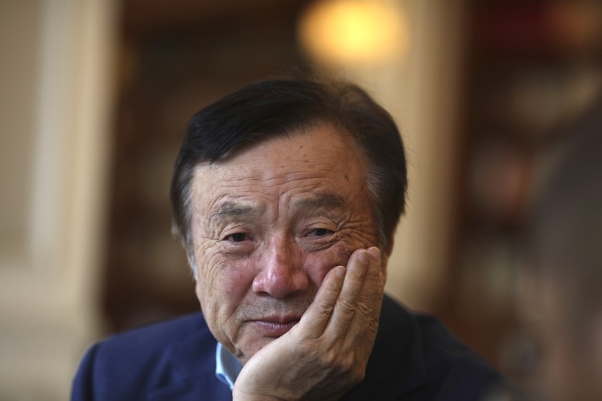 In this Aug. 20, 2019, photo, Huawei&#039;s founder and CEO Ren Zhengfei pauses during conversation with colleagues at the Huawei campus in Shenzhen in Southern China&#039;s Guangdong province. Ren sa ...