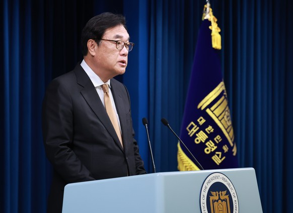 epa11757835 South Korea&#039;s presidential chief of staff, Chung Jin-suk, gives a briefing at the presidential office in Seoul, South Korea, 05 December 2024. Jin-suk announced that South Korean Pres ...