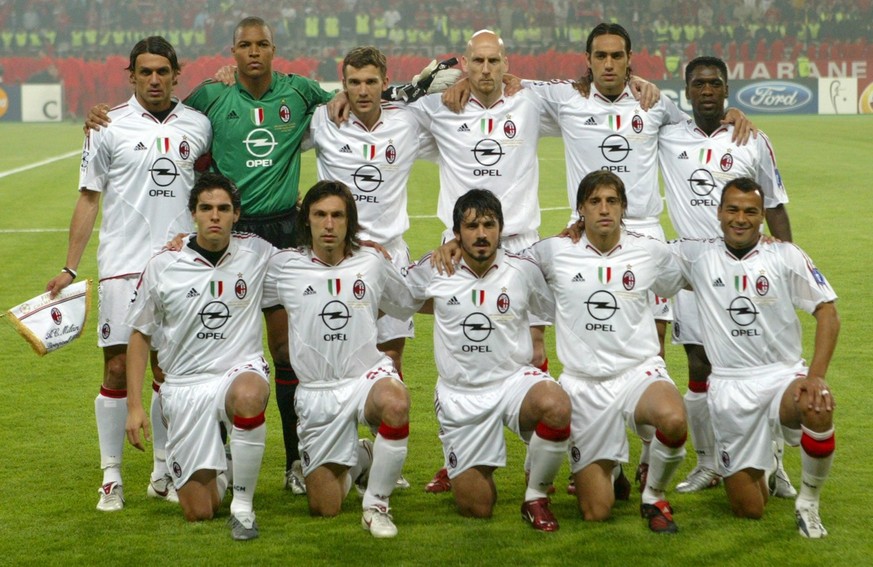 AC Milan players (front row, L-R) Kaka, Andrea Pirlo, Gennaro Gattuso, Hernan Crespo and Cafu; (back row, L-R) Paolo Maldini, goalkeeper Dida, Andriy Shevchenko, Jaap Stam, Alessandro Nesta and Claren ...