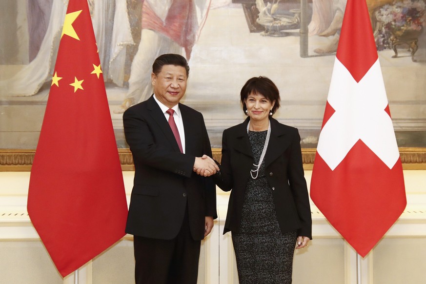 Swiss Federal President Doris Leuthard and China&#039;s President Xi Jinping shake hands prior to the official talks in Bern, Switzerland January 16, 2017 REUTERS/POOL/Peter Klaunzer
