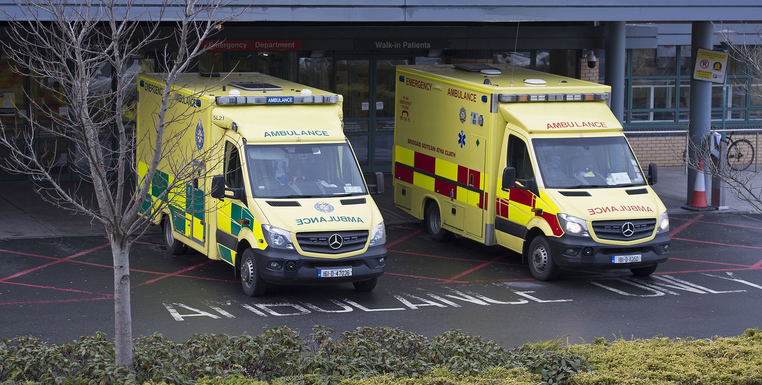 epa08933024 Emergency ambulances pictured at an Accident and Emergency Department of a Dublin City Hospital, in Dublin, Ireland, 12 January 2021. Ireland is currently witnessing a enormous surge of CO ...