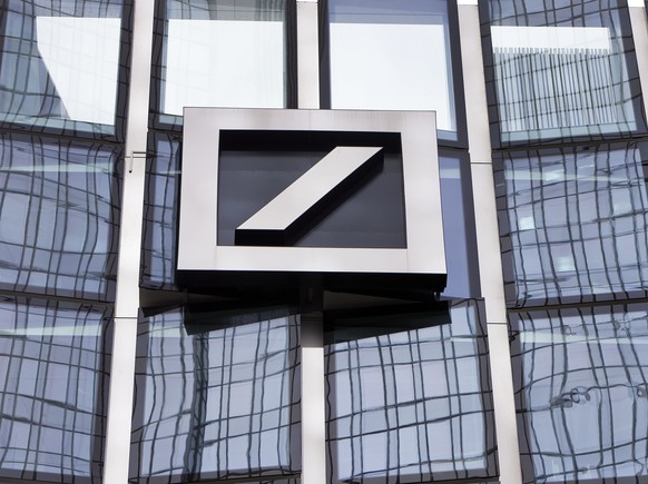 FILE - The Deutsche Bank logo is displayed at a bank&#039;s building in Frankfurt, Germany, April 9, 2018. Shares in Deutsche Bank, Germany?s largest lender, have fallen sharply and dragged down major ...