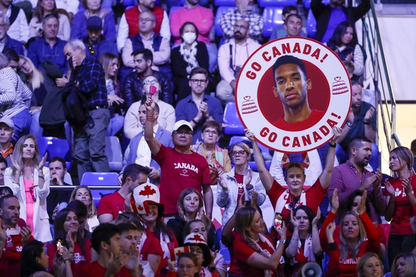 epa10332636 Supportes cheer for Canada's Felix Auger-Aliassime during his match against Australia's Alex De Minaur in the Davis Cup final between Canada and Australia in Malaga, Andalusia, southern Sp ...