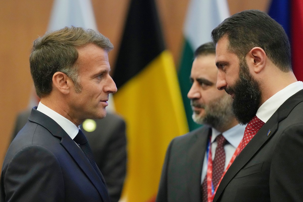 FILE - French President Emmanuel Macron, left, talks with the Syrian President Ahmad al-Sharaa during the EU Summit in Nicosia, Cyprus, April 24, 2026. (AP Photo/Petros Karadjias, File)
Emmanuel Macro ...