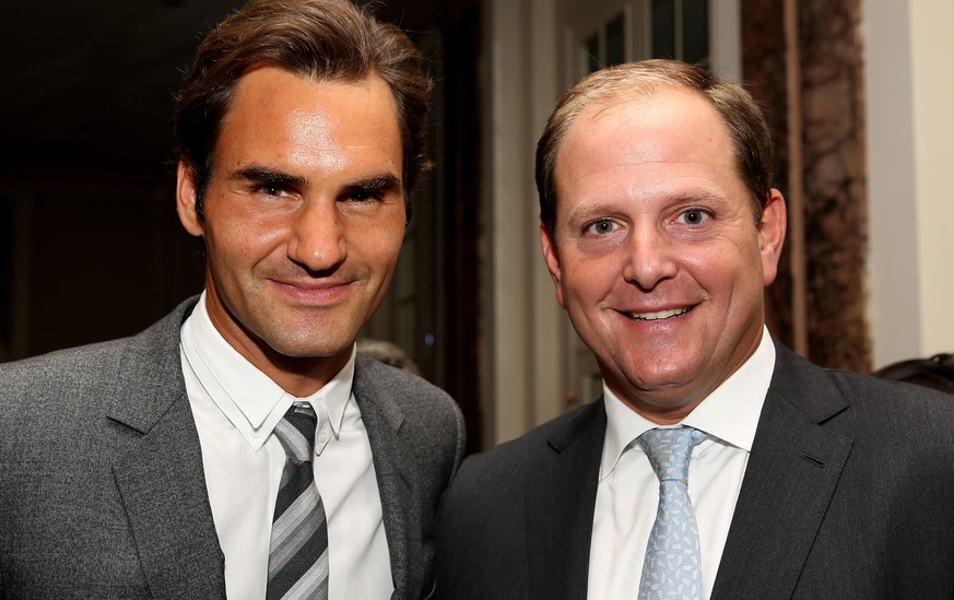 NEW YORK, NY - AUGUST 23: Roger Federer of Switzerland and Tony Godsick pose for photographers during the ATP Heritage Celebration at The Waldorf=Astoria on August 23, 2013 in New York City. (Photo by ...