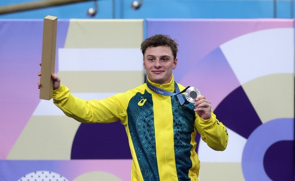 epa11540577 Silver medalist Matthew Richardson of Australia poses on the podium for the Men Sprint of the Track Cycling competitions in the Paris 2024 Olympic Games, at Saint-Quentin-en-Yvelines Velod ...