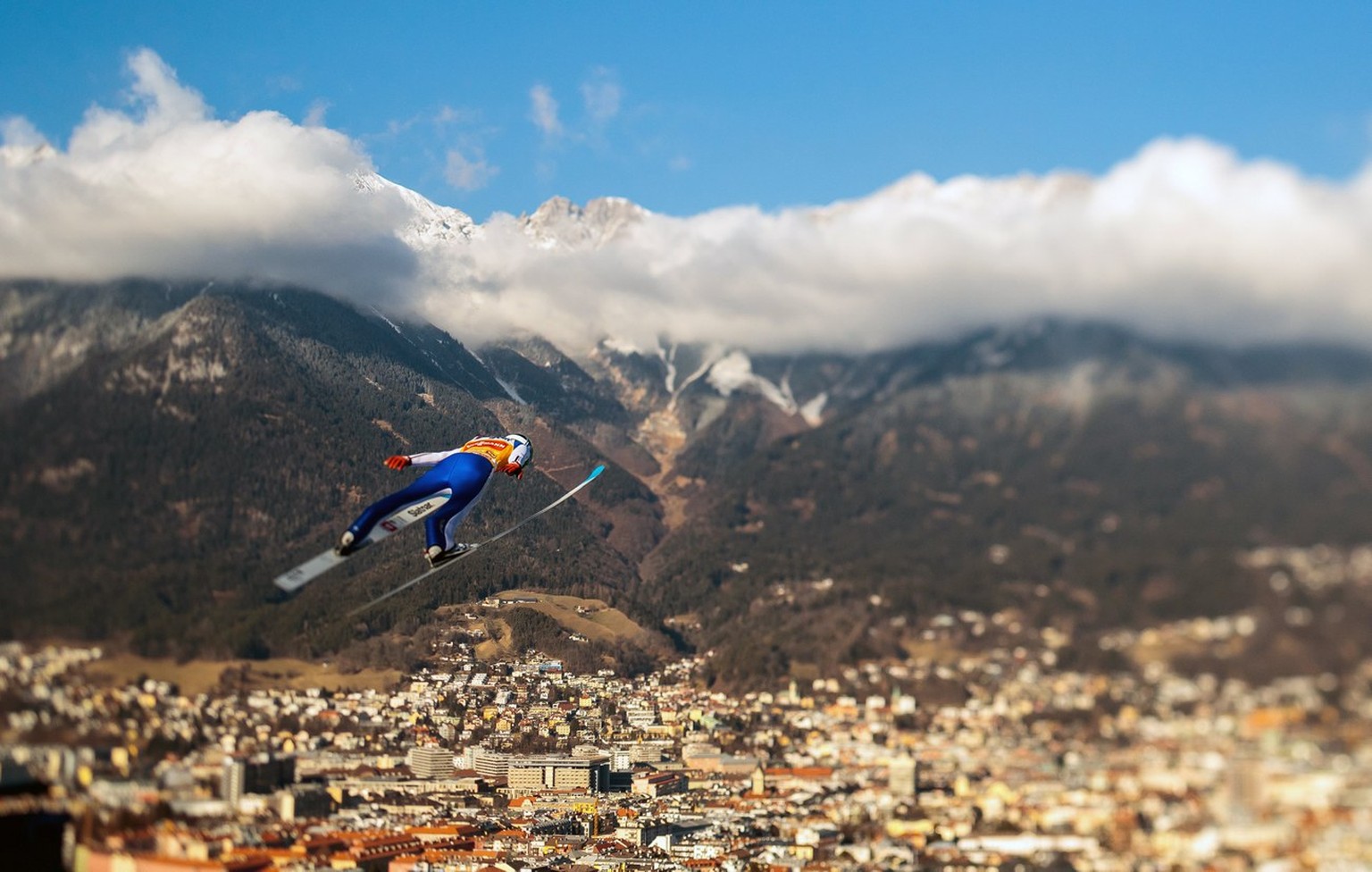 epa06254039 YEARENDER 2017 JANUARY ..A picture taken with a Tilt-Shift lens of Domen Prevc of Slovenia during his practice jump at the Four Hills ski jumping tournament for FIS Ski Jumping World Cup o ...