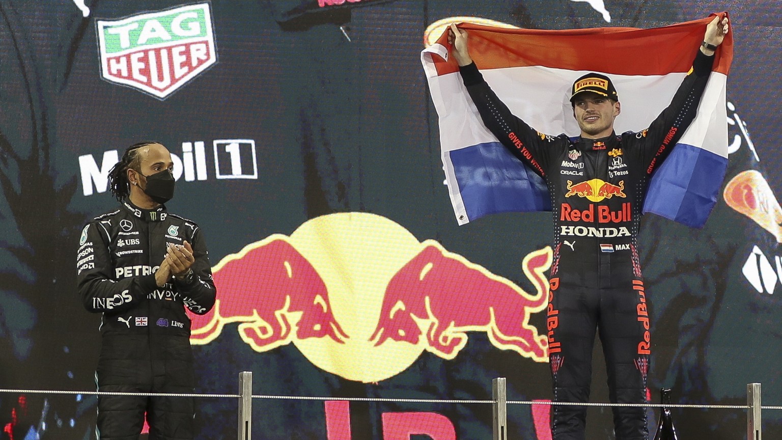 epa09638710 Winner Dutch Formula One driver Max Verstappen (C) of Red Bull Racing, second placed British Formula One driver Lewis Hamilton (L) of Mercedes-AMG Petronas and third Spanish Formula One dr ...