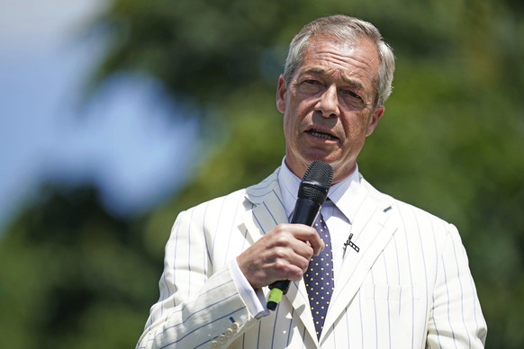 Reform UK leader Nigel Farage speaks at the Mercure Maidstone Great Danes Hotel while on the General Election campaign trail, in in Maidstone, England, Monday, June 24, 2024. United Kingdom voters wil ...