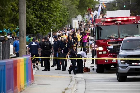 Police and firefighters respond after a truck drove into a crowd of people during The Stonewall Pride Parade and Street Festival in Wilton Manors on Saturday, June 19, 2021. WPLG-TV reports that the d ...