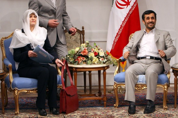 Iranian President Mahmoud Ahmadinejad, right, looks on during a meeting with Swiss Foreign Minister Micheline Calmy-Rey, left, in Tehran, Iran, Monday March 17, 2008. Swiss energy trading company EGL  ...