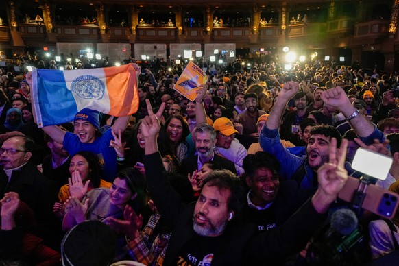 Supporters for Democratic mayoral candidate Zohran Mamdani react as they watch returns during an election night watch party, Tuesday, Nov. 4, 2025, in New York. (AP Photo/Yuki Iwamura)
Election 2025 M ...