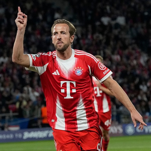 Bayern's Harry Kane celebrates after scoring a penalty, the opening goal of his team during the Champions League semifinal first leg soccer match between Paris Saint-Germain and Bayern Munich in  ...