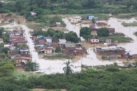 epa09987051 A handout photo made available by the Presidency of Brazil that shows an aerial view of the city of Recife affected by heavy rains, in Recife, Brazil, 30 May 2022. The heavy rains that hit ...