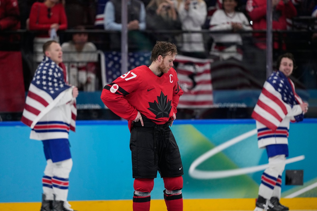 KEYPIX - Canada's Connor McDavid (97) reacts after Canada lost to the United States in a men's ice hockey gold medal game between Canada and the United States at the 2026 Winter Olympics, in ...