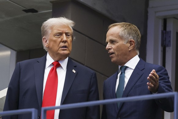epa12360280 US President Donald J. Trump (L) and Jean-Frederic Dufour (R), CEO of Rolex, arrive to the US Open Tennis Championships at the USTA Billie Jean King National Tennis Center, ahead of the me ...