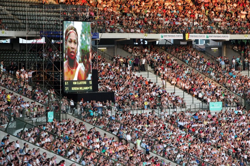 U.S. Serena Williams is seen on a giant screen during an exhibition match &quot;Best of Belgium&quot; against Belgium's Kim Clijsters at the King Baudouin stadium in Brussels, Thursday July 8, 2010. T ...
