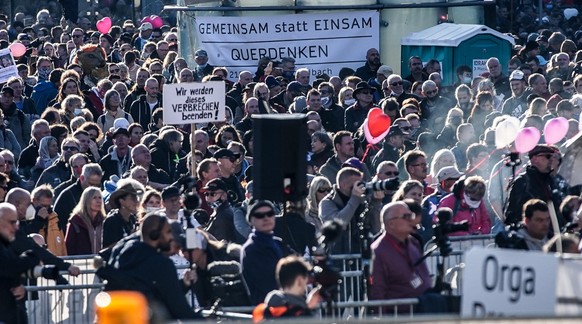 epa08804444 Protesters gather during a demonstration against coronavirus restrictions in Leipzig, Germany, 07 November 2020. Effective from 02 November, Germany is on nationwide restrictions to preven ...