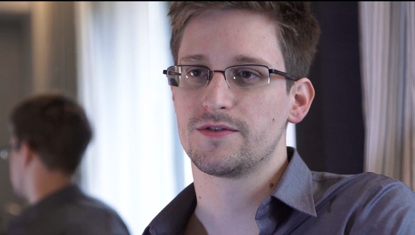 This June 9, 2013 photo provided by The Guardian Newspaper in London shows Edward Snowden in Hong Kong. The National Security Agency is telling Congress that an agency employee resigned after admittin ...