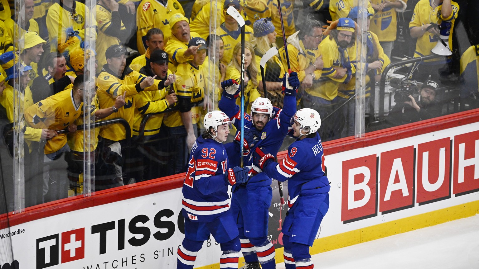 epa12130815 Conor Garland (C) of the US celebrates with teammates after scoring his team&#039;s third goal goal during the IIHF Ice Hockey World Championship semifinal match between Sweden and the USA ...