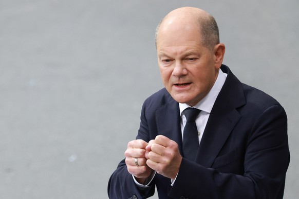 epa11718516 German Chancellor Olaf Scholz delivers a speech at the German Parliament Bundestag in Berlin, Germany, 13 November 2024. German Chancellor Scholz delivered a government statement on the cu ...