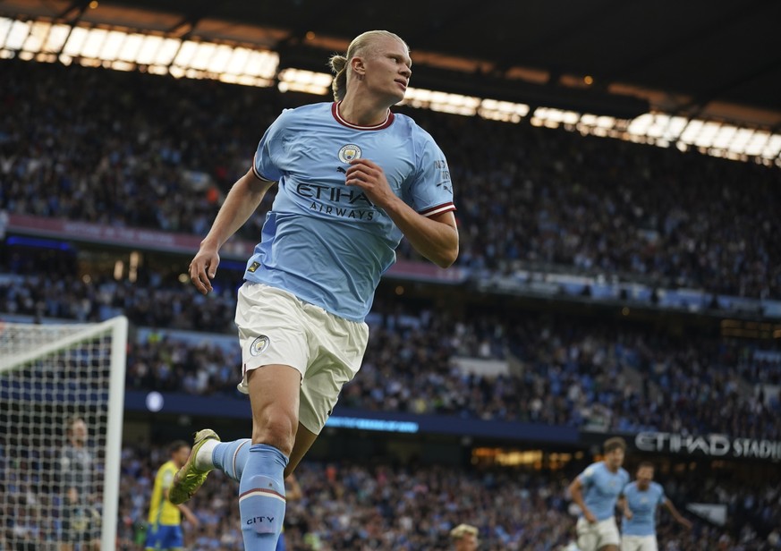 Manchester City&#039;s Erling Haaland celebrates after scoring his side&#039;s opening goal during the English Premier League soccer match between Manchester City and Nottingham Forest at Etihad Stadi ...