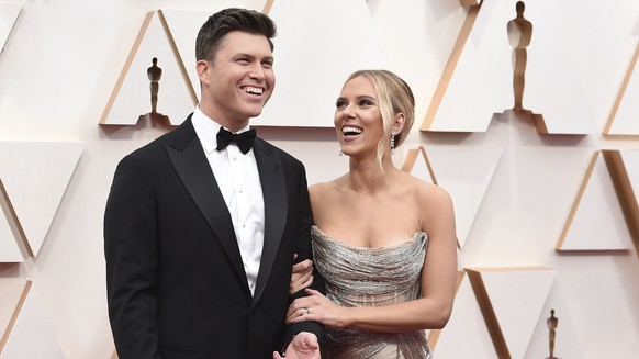 FILE - In this Feb. 9, 2020 file photo, Colin Jost, left, and Scarlett Johansson arrive at the Oscars in Los Angeles. Meals on Wheels America announced Thursday on Instagram that Johansson and Jost ma ...