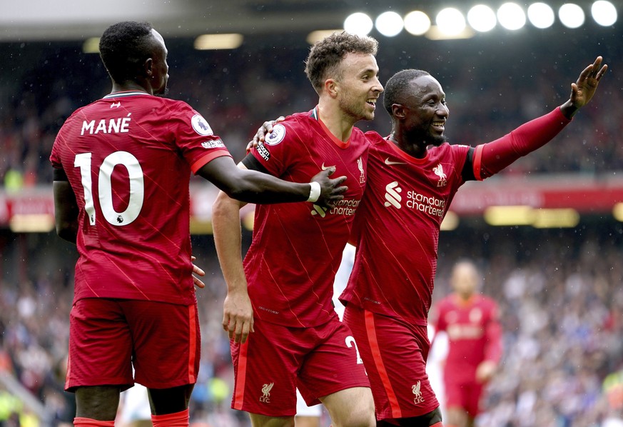 Liverpool&#039;s Diogo Jota, center, celebrates scoring with teammates during the English Premier League soccer match between Liverpool and Burnley at Anfield, Liverpool, England, Saturday Aug. 21, 20 ...