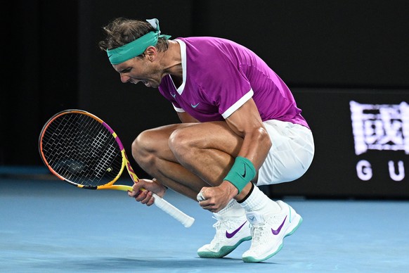 epa09699758 Rafael Nadal of Spain reacts during his third round Men?s singles match against Karen Khachanov of Russia on Day 5 of the Australian Open Tennis Tournament at Melbourne Park in Melbourne,  ...