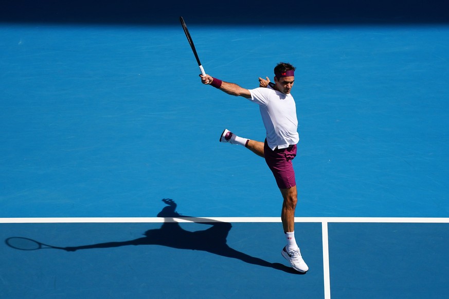 epa10185720 (FILE) - Roger Federer of Switzerland in action against Tennys Sandgren of the USA during their fifth round match at the Australian Open tennis tournament at Melbourne Park in Melbourne, A ...