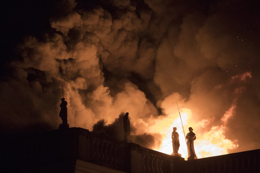 Flames engulf the 200-year-old National Museum of Brazil, in Rio de Janeiro, Sunday, Sept. 2, 2018. According to its website, the museum has thousands of items related to the history of Brazil and oth ...