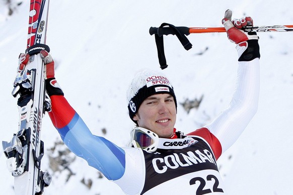 Swiss Carlo Janka celebrates in the finish area after winning the men&#039;s Alpine Skiing World Giant Slalom race in Val d&#039; sere, France, Saturday, December 13, 2008. (KEYSTONE/Jean-Christophe B ...