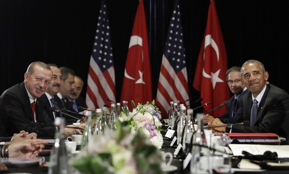 U.S. President Barack Obama and Turkish President Recep Tayyip Erdogan pause before speaking to the media after a bilateral meeting in Hangzhou in eastern China&#039;s Zhejiang province, Sunday, Sept. ...