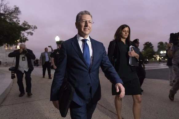 epa07894052 Former US Special Representative for Ukraine Kurt Volker (C) departs after being deposed behind closed doors amid the US House of Representatives&#039; impeachment inquiry into President T ...