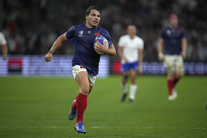 France&#039;s Antoine Dupont runs in to score his side&#039;s seventh try during the Rugby World Cup Pool A match between France and Namibia at the Stade de Marseille in Marseille, France, Thursday, S ...