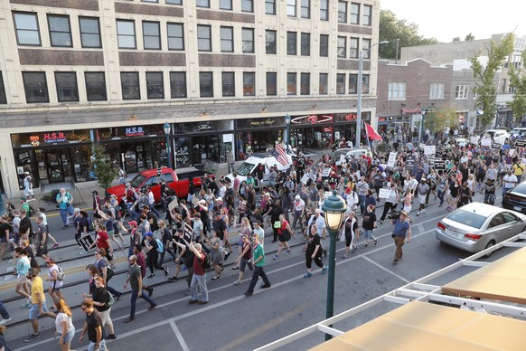 Protesters gather on a street in St. Louis, Mo., on Saturday, Sept. 16, 2017, in response to a not guilty verdict in the trial of former St. Louis Police officer Jason Stockley. On Friday, Stockley, a ...