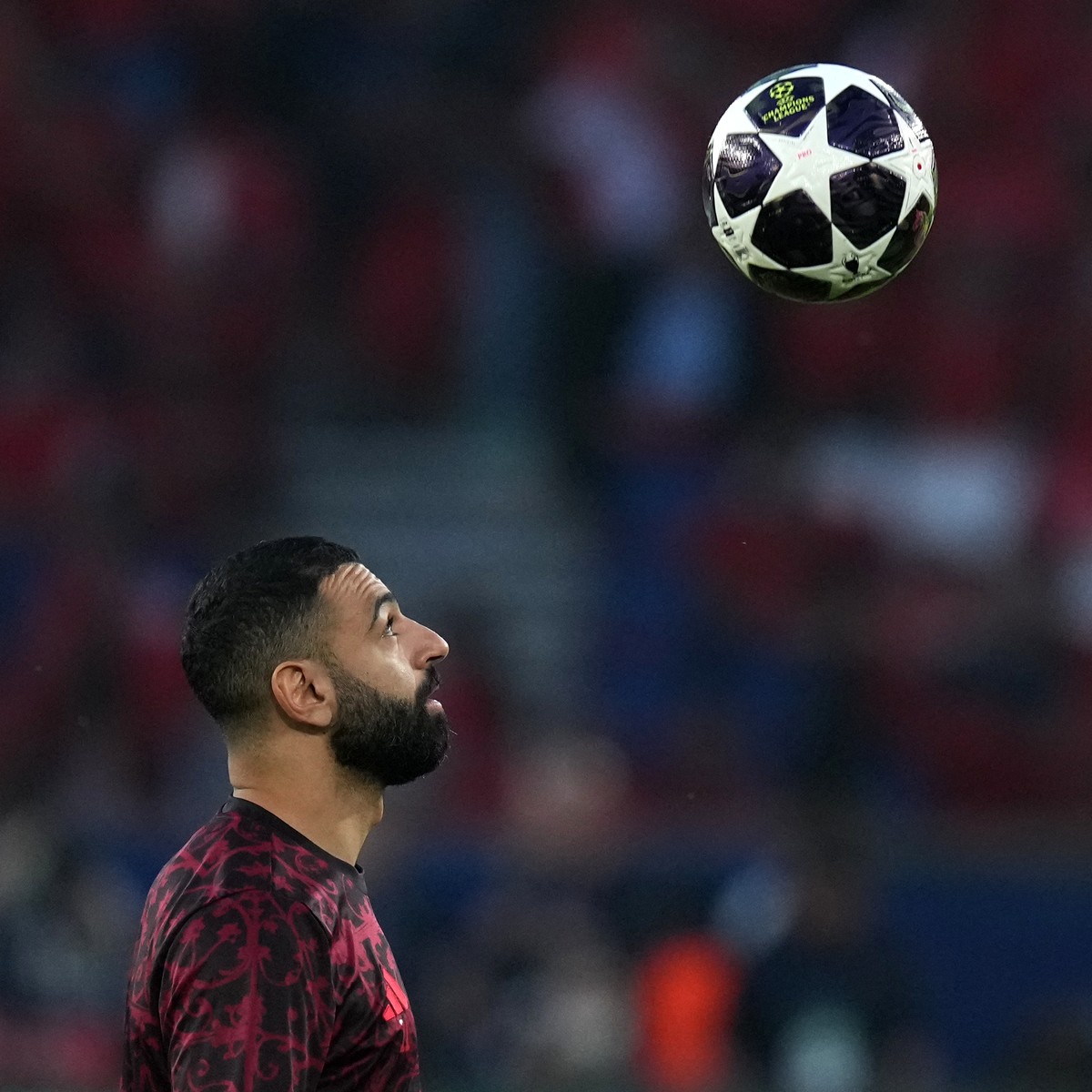 Liverpool's Mohamed Salah controls the ball during warm up before the Champions League quarterfinal first leg soccer match between Paris Saint-Germain and Liverpool in Paris, Wednesday, April 8,  ...