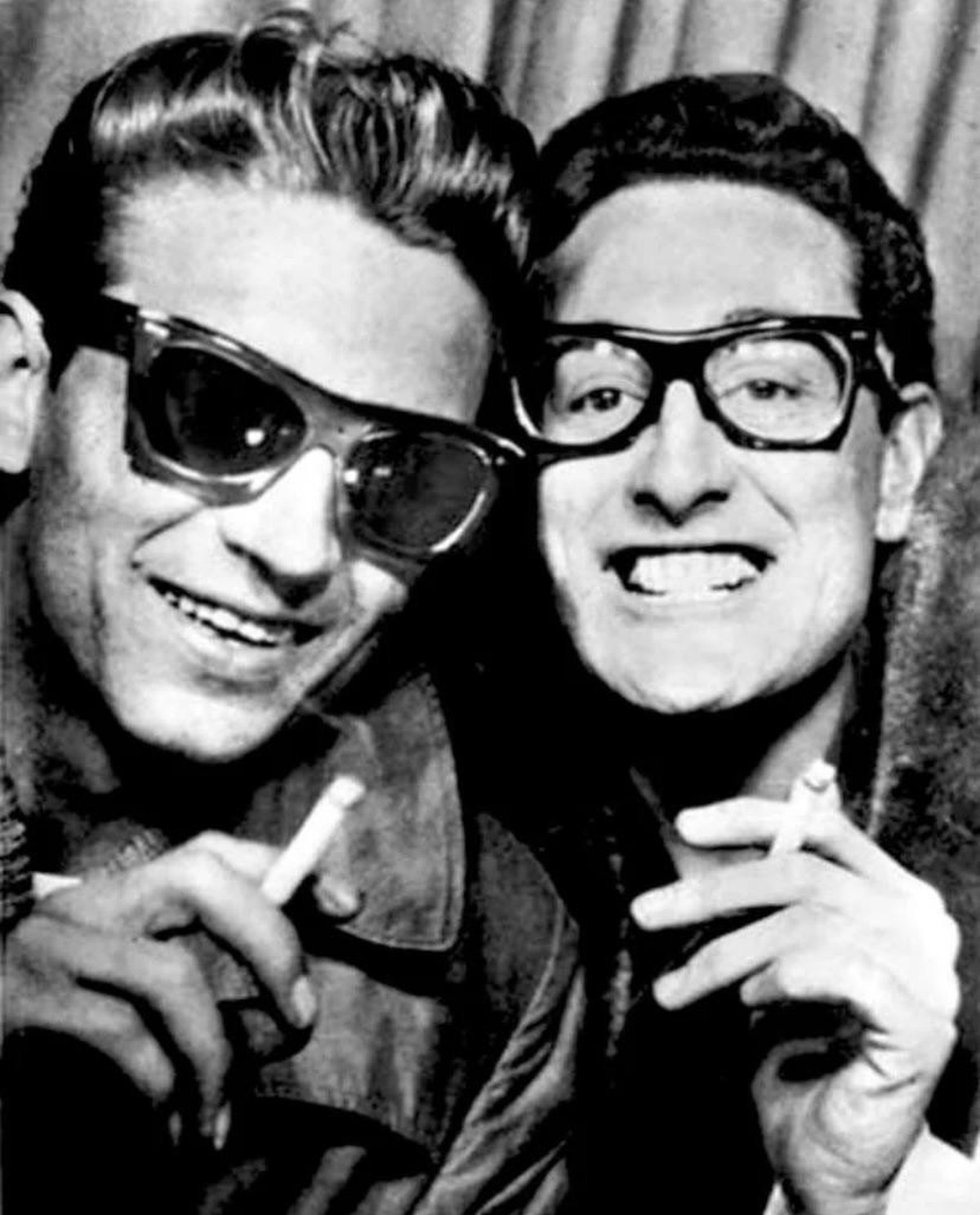 Buddy Holly and Waylon Jennings 

January 1959 in New York City (likely at a photobooth in Grand Central Station or Times Square), just weeks before the fateful "Winter Dance Party" tour beg ...