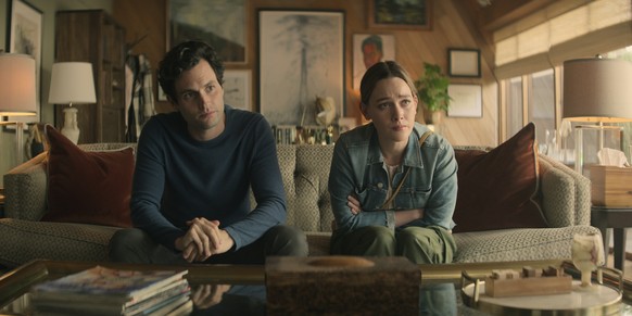 This image released by Netflix shows Penn Badgley, left, and Victoria Pedretti in a scene from &quot;You.&quot; The series became a worldwide hit for Netflix after a low-key U.S. start on Lifetime. (N ...