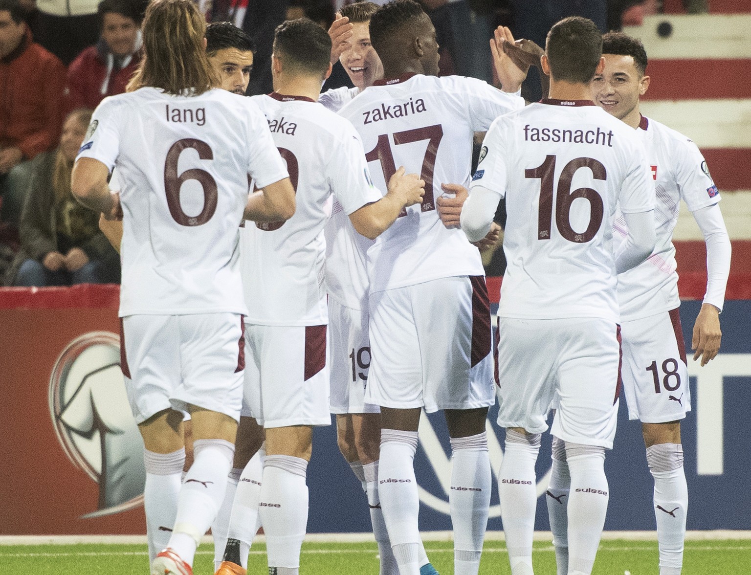 Switzerland players celebrate after Cedric Itten scored the opening goal during a Euro 2020 Group D qualifying soccer match between Gibraltar and Switzerland at the Victoria stadium in Gibraltar, Mond ...