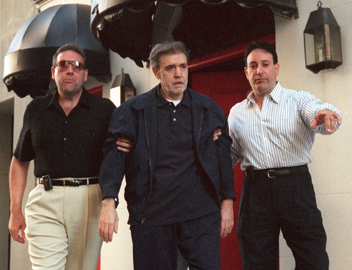 Mob boss Vincent "The Chin" Gigante, center, is led from his upper East side Manhattan apartment, Friday, July 11, 1997, in New York en route to U.S. District court in Brooklyn, where he is  ...