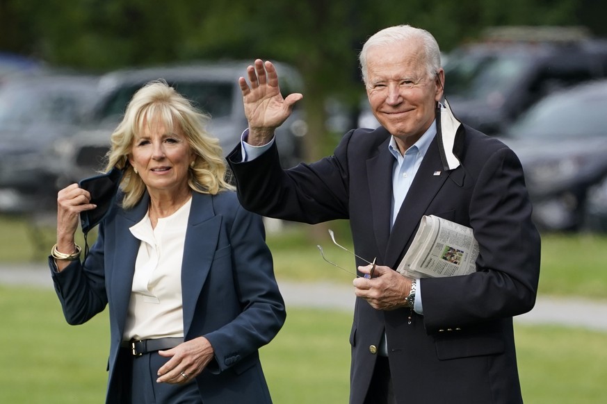 FILE - President Joe Biden and first lady Jill Biden walk to board Marine One for his first international trip as President, on June 9, 2021, in Washington. (AP Photo/Evan Vucci, File)
Joe Biden