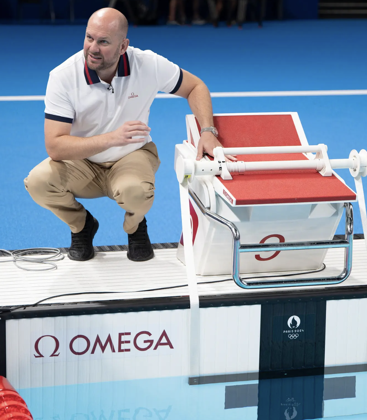 Alain Zobrist, CEO von Omega Timing, erklärt die Zeitmesstechnologie beim Schwimmen.