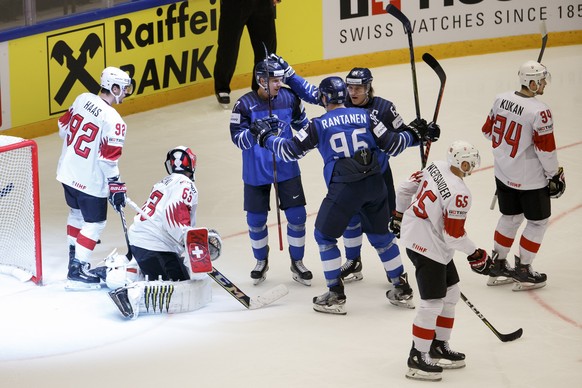 Finland&#039;s defender Markus Nutivaara, 3rd left, celebrates his goal withe teammates forward Mikko Rantanen #96 and forward Mikael Granlund, 3rd right, between Switzerland&#039;s players forward Ga ...