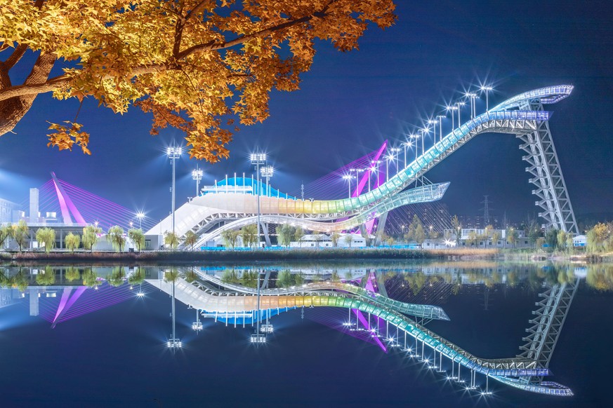 BEIJING, CHINA - OCTOBER 27: Illuminated Big Air Shougang, venue of Beijing 2022 Winter Olympics, is pictured at Shougang Park on October 27, 2021 in Beijing, China.