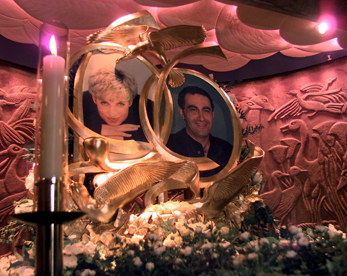 One of two granite and bronze sculptures dedicated to the late Diana, Princess of Wales, and her companion Dodi Fayed, displayed in the Egyptian Hall of London's Harrods department store Monday,  ...