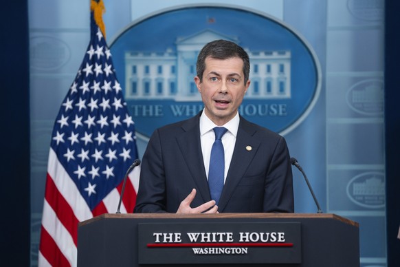 FILE - Transportation Secretary Pete Buttigieg speaks during a press briefing at the White House, March 27, 2024, in Washington. New vehicles sold in the U.S. will have to average about 38 miles per g ...